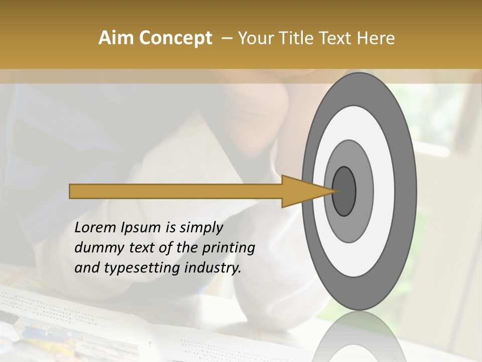 A Young Boy Reading A Book On Top Of A Table PowerPoint Template