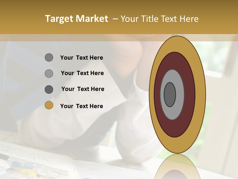 A Young Boy Reading A Book On Top Of A Table PowerPoint Template