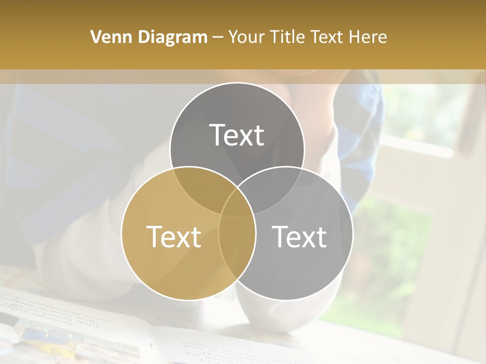 A Young Boy Reading A Book On Top Of A Table PowerPoint Template