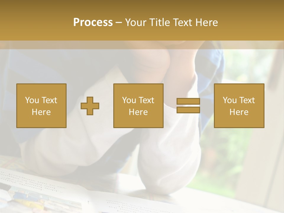 A Young Boy Reading A Book On Top Of A Table PowerPoint Template