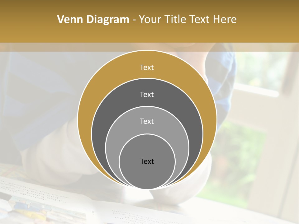 A Young Boy Reading A Book On Top Of A Table PowerPoint Template