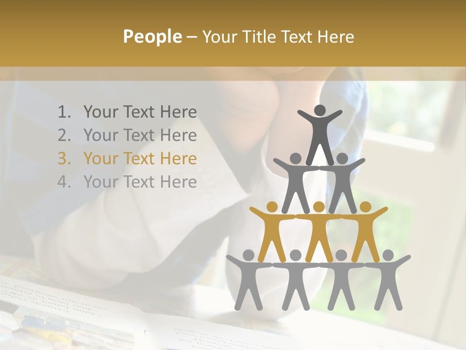 A Young Boy Reading A Book On Top Of A Table PowerPoint Template