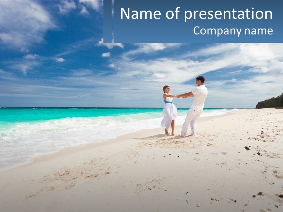 A Man And Woman On A Beach Holding Hands PowerPoint Template