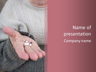 A Person Holding A Pill Pill In Their Hand PowerPoint Template