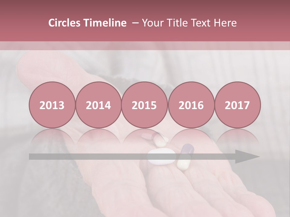 A Person Holding A Pill Pill In Their Hand PowerPoint Template