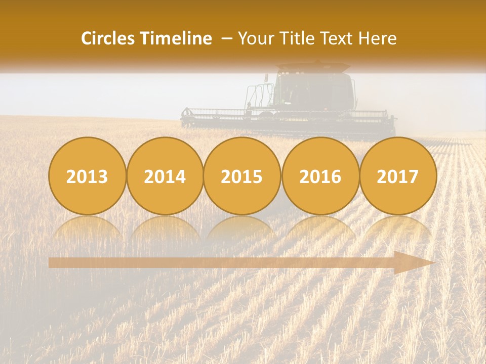 A Farm Field With A Combiner In The Middle Of It PowerPoint Template