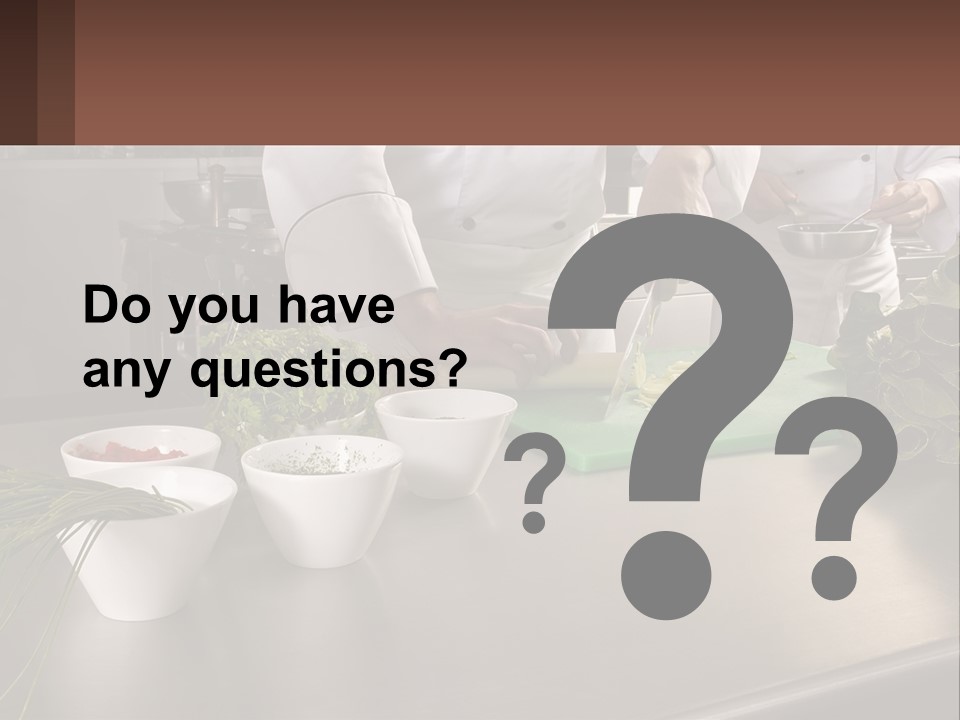 A Group Of Chefs Preparing Food In A Kitchen PowerPoint Template