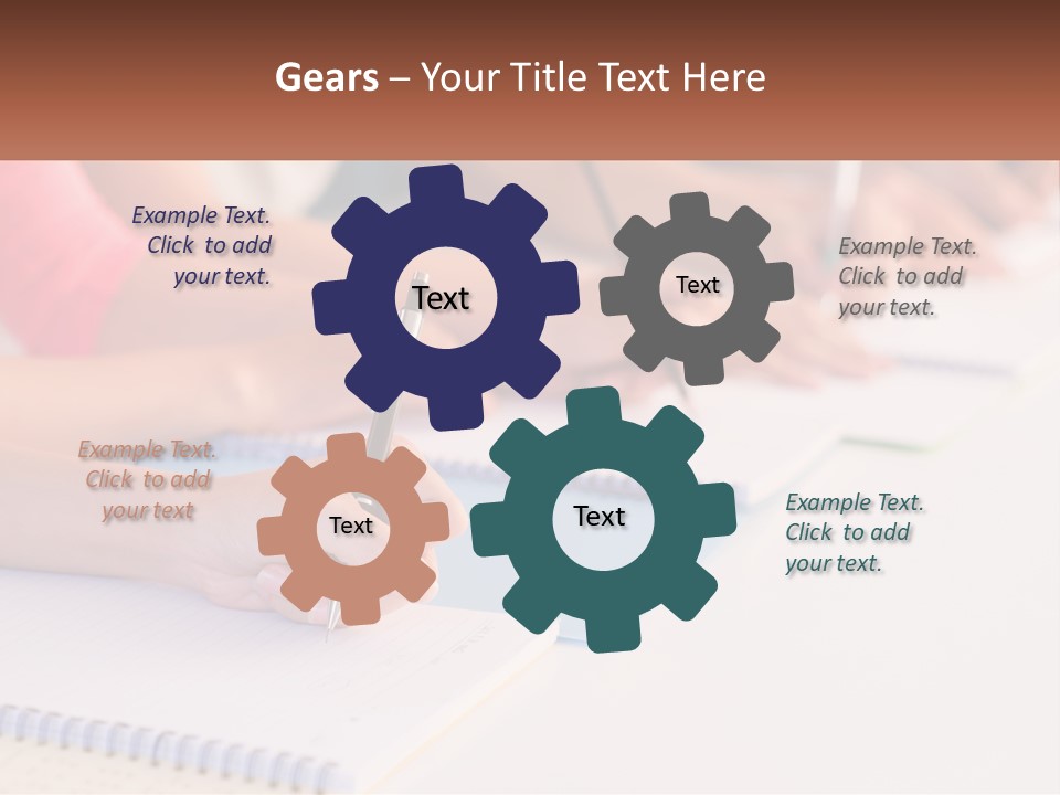 A Group Of People Sitting At A Table Writing On Notebooks PowerPoint Template