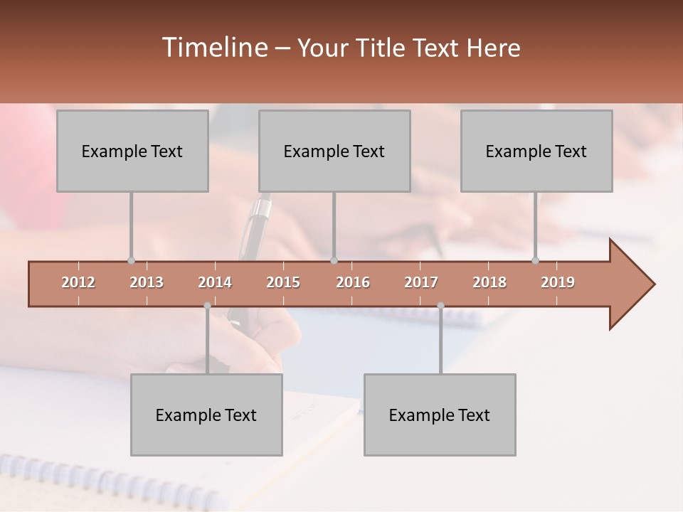 A Group Of People Sitting At A Table Writing On Notebooks PowerPoint Template