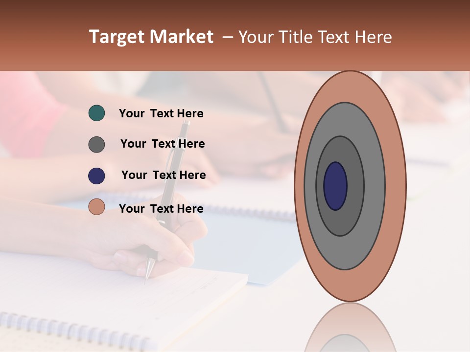 A Group Of People Sitting At A Table Writing On Notebooks PowerPoint Template