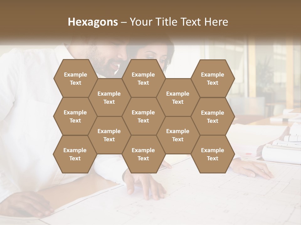 A Man And Woman Sitting At A Desk In An Office PowerPoint Template