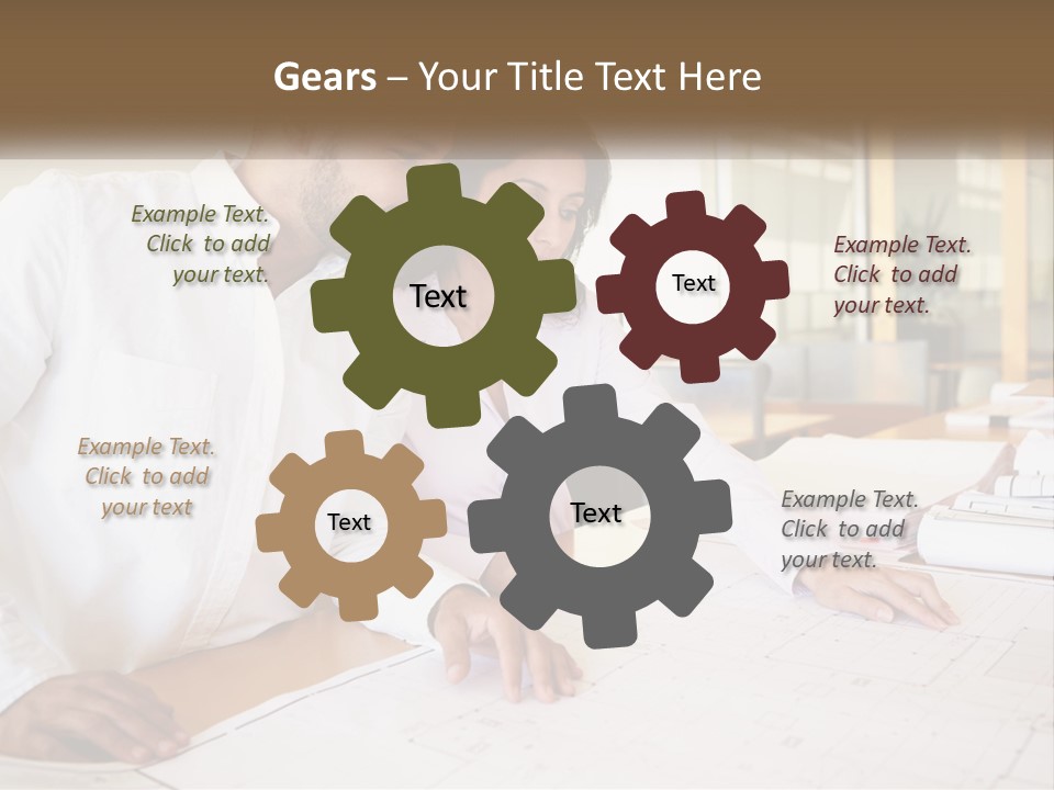 A Man And Woman Sitting At A Desk In An Office PowerPoint Template