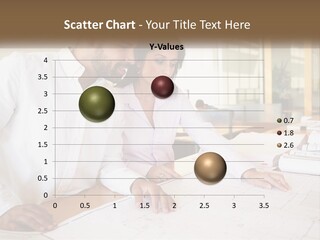 A Man And Woman Sitting At A Desk In An Office PowerPoint Template