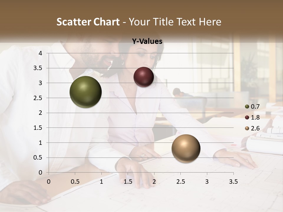 A Man And Woman Sitting At A Desk In An Office PowerPoint Template