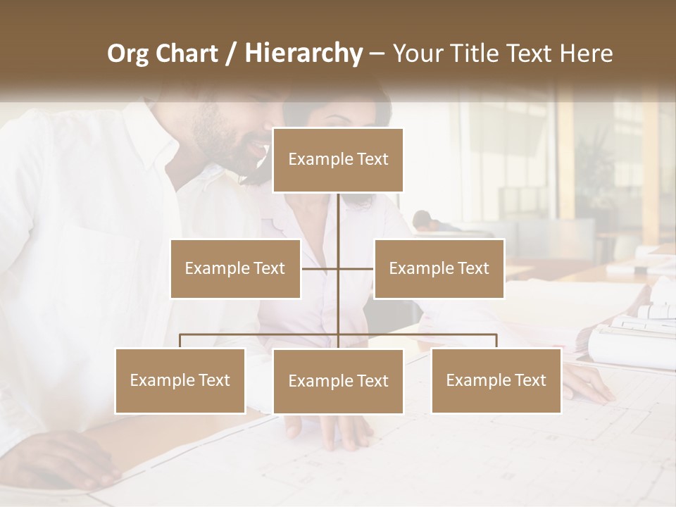 A Man And Woman Sitting At A Desk In An Office PowerPoint Template