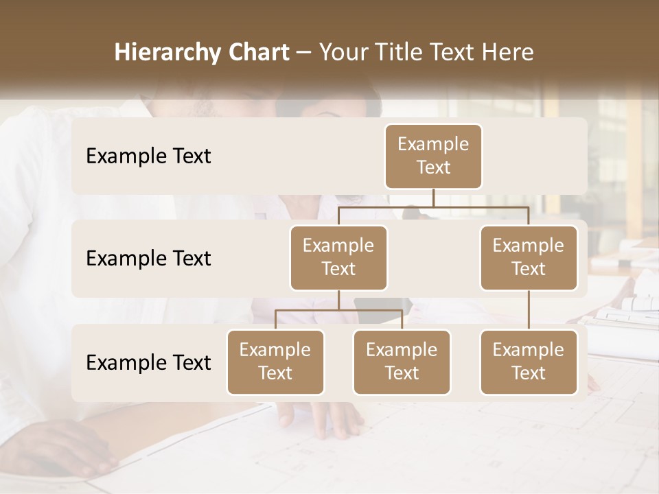 A Man And Woman Sitting At A Desk In An Office PowerPoint Template