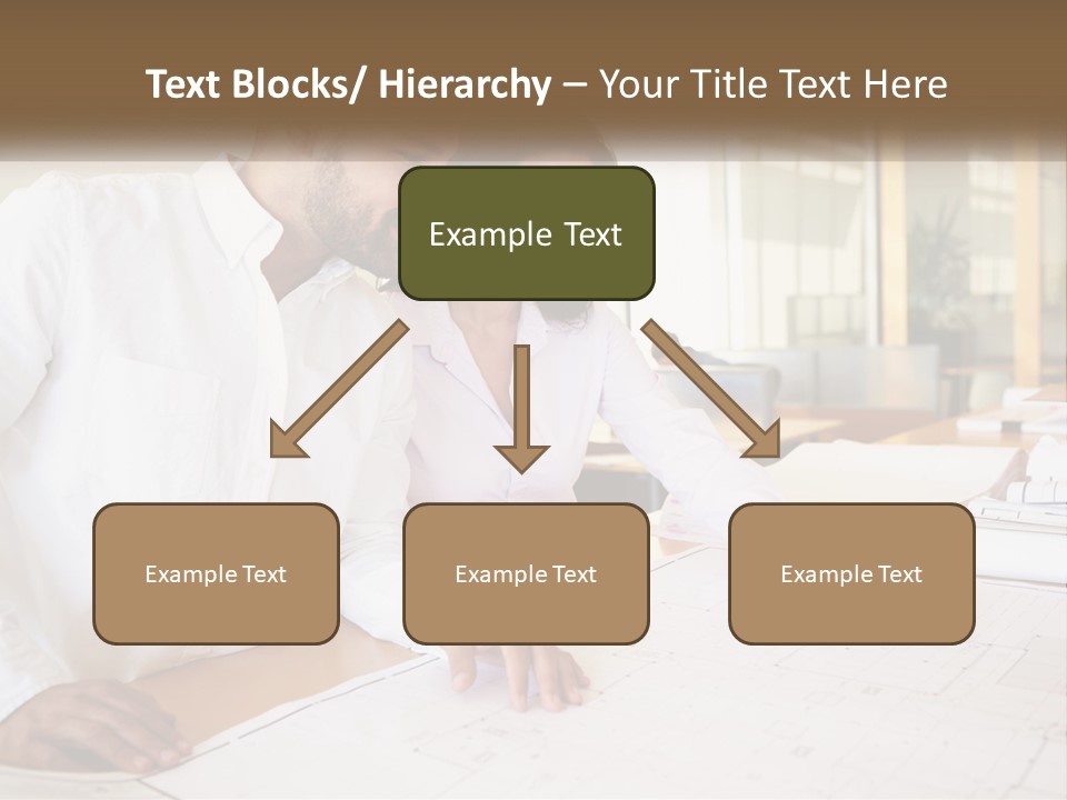 A Man And Woman Sitting At A Desk In An Office PowerPoint Template
