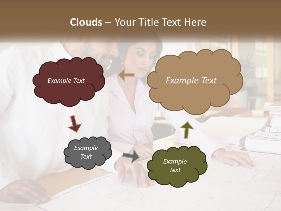 A Man And Woman Sitting At A Desk In An Office PowerPoint Template