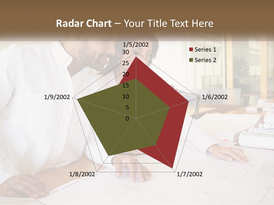 A Man And Woman Sitting At A Desk In An Office PowerPoint Template
