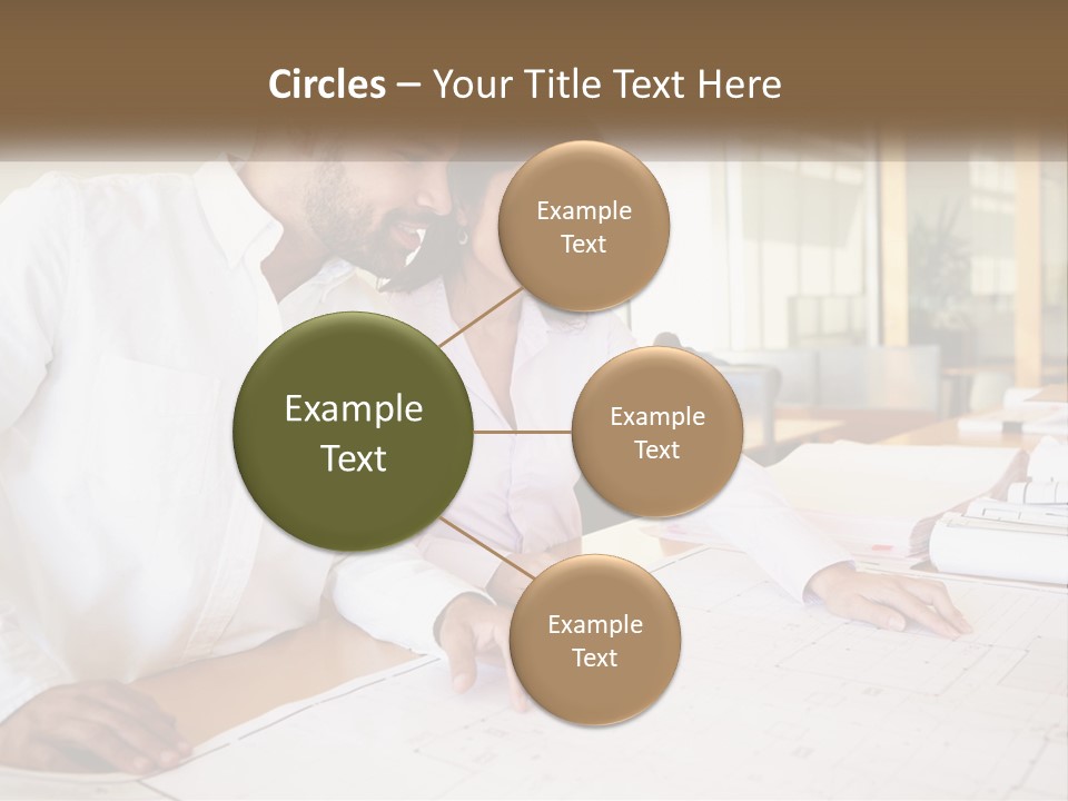 A Man And Woman Sitting At A Desk In An Office PowerPoint Template
