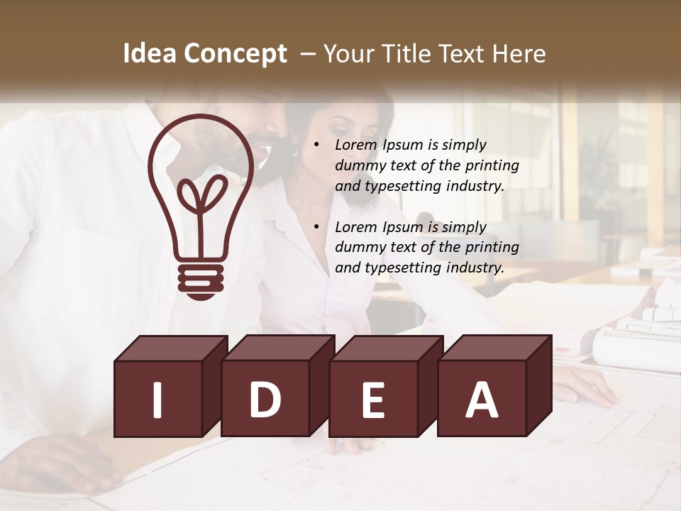 A Man And Woman Sitting At A Desk In An Office PowerPoint Template