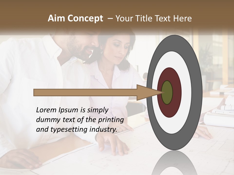 A Man And Woman Sitting At A Desk In An Office PowerPoint Template