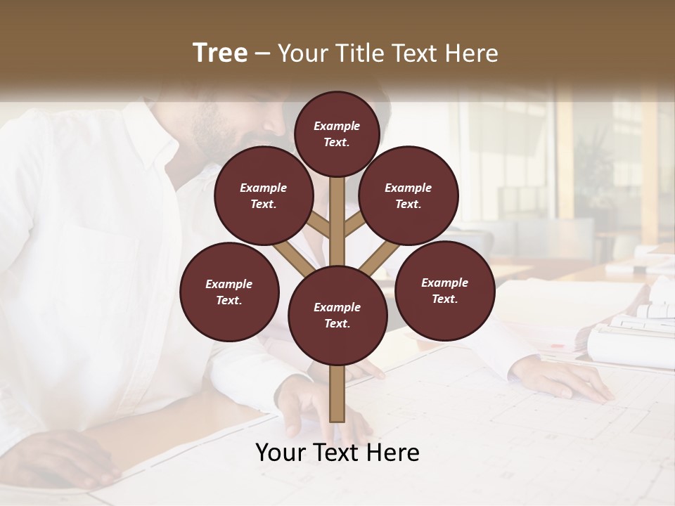 A Man And Woman Sitting At A Desk In An Office PowerPoint Template