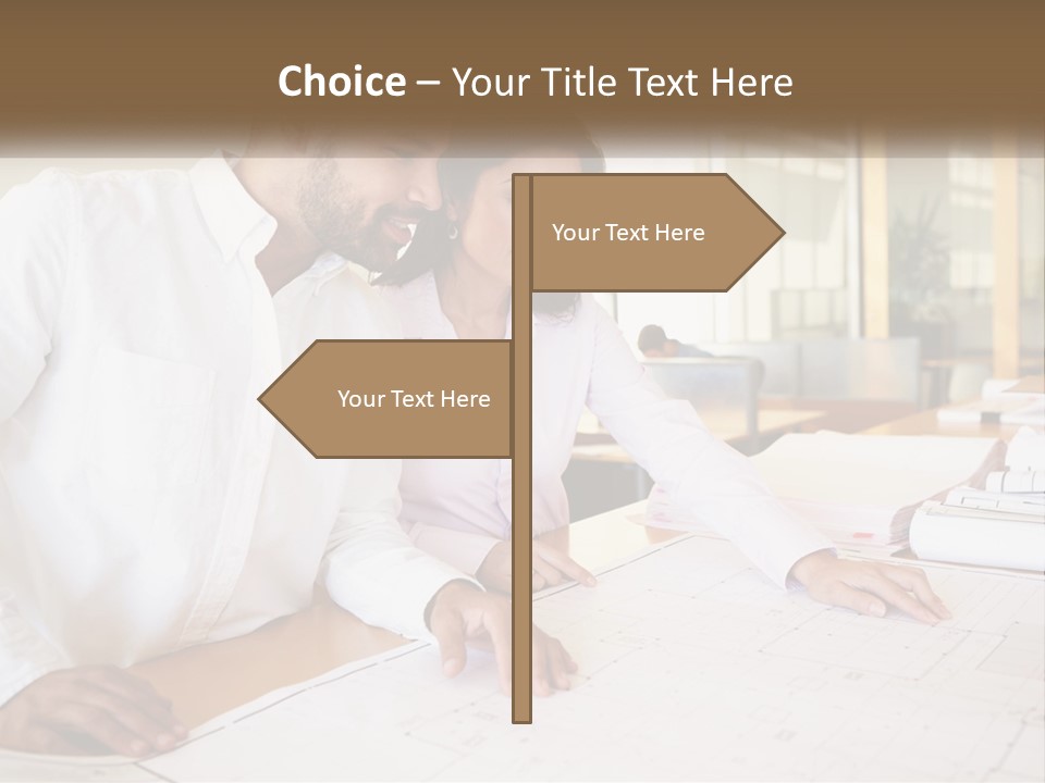 A Man And Woman Sitting At A Desk In An Office PowerPoint Template