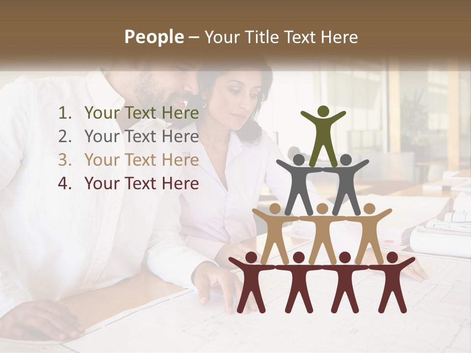 A Man And Woman Sitting At A Desk In An Office PowerPoint Template