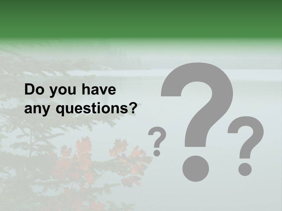 A Lake Surrounded By Trees With Fog In The Background PowerPoint Template