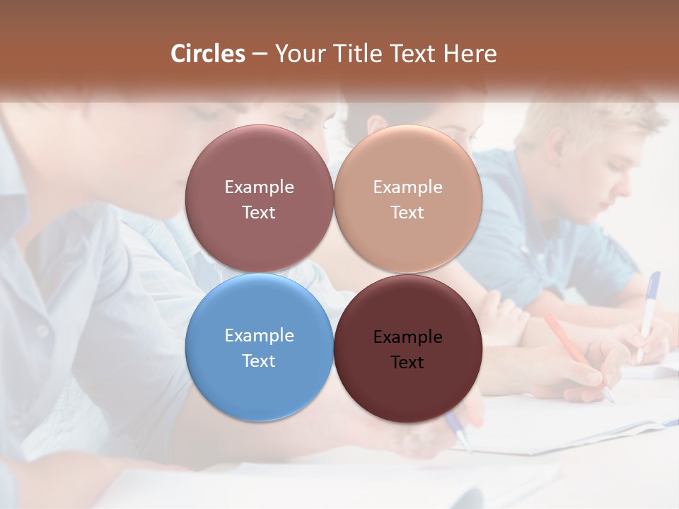 A Group Of People Sitting At A Table Writing PowerPoint Template