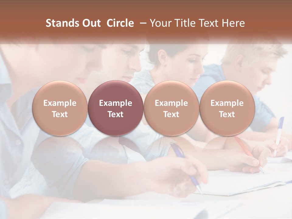 A Group Of People Sitting At A Table Writing PowerPoint Template