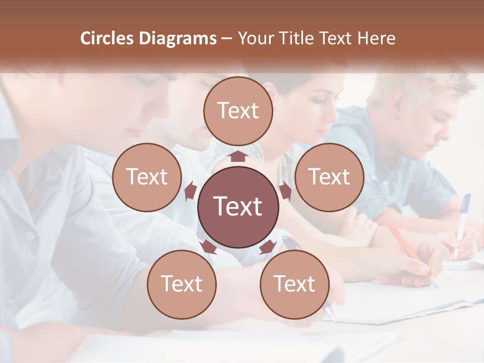 A Group Of People Sitting At A Table Writing PowerPoint Template