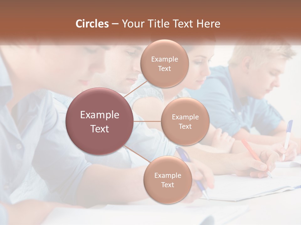 A Group Of People Sitting At A Table Writing PowerPoint Template