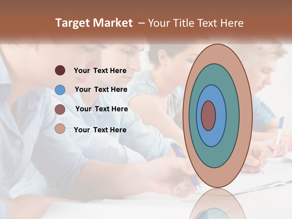 A Group Of People Sitting At A Table Writing PowerPoint Template