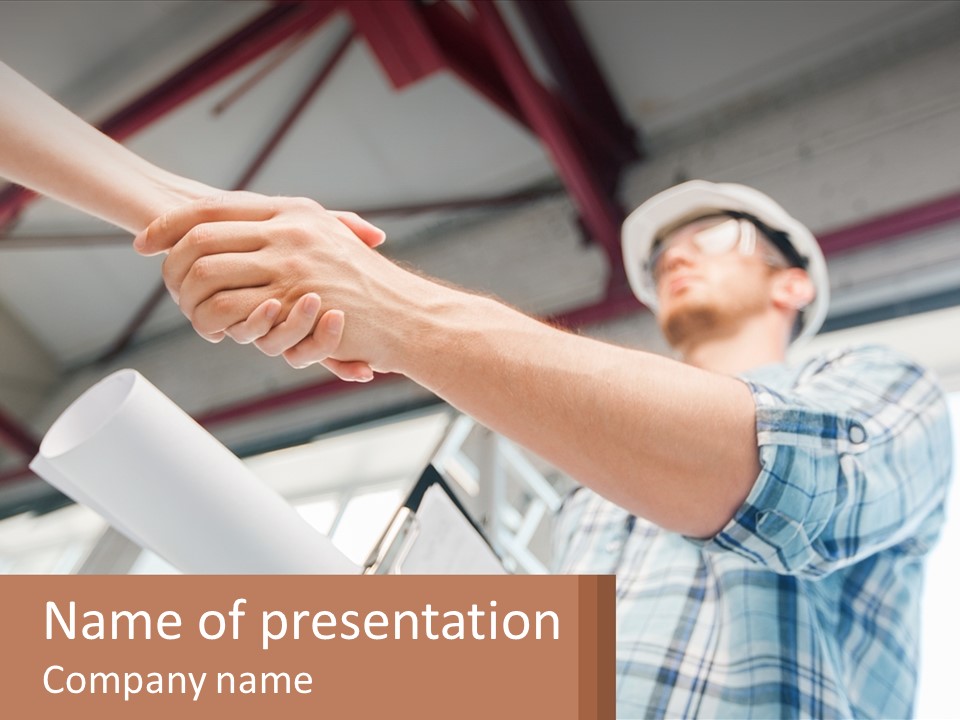 Two People Shaking Hands Over A Piece Of Paper PowerPoint Template