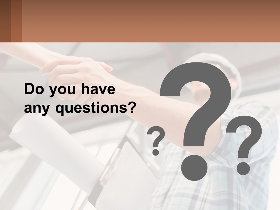 Two People Shaking Hands Over A Piece Of Paper PowerPoint Template