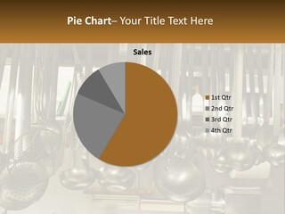 A Bunch Of Spoons Hanging From A Rack In A Kitchen PowerPoint Template