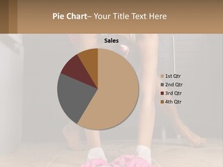 A Woman Bending Over On The Floor In A Kitchen PowerPoint Template