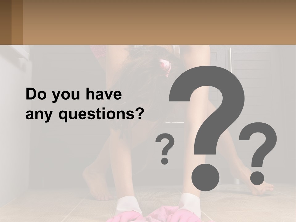 A Woman Bending Over On The Floor In A Kitchen PowerPoint Template