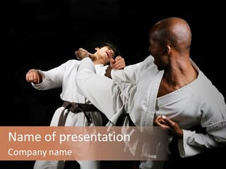 Two Men Fighting In A Karate Match Powerpoint Presentation PowerPoint Template