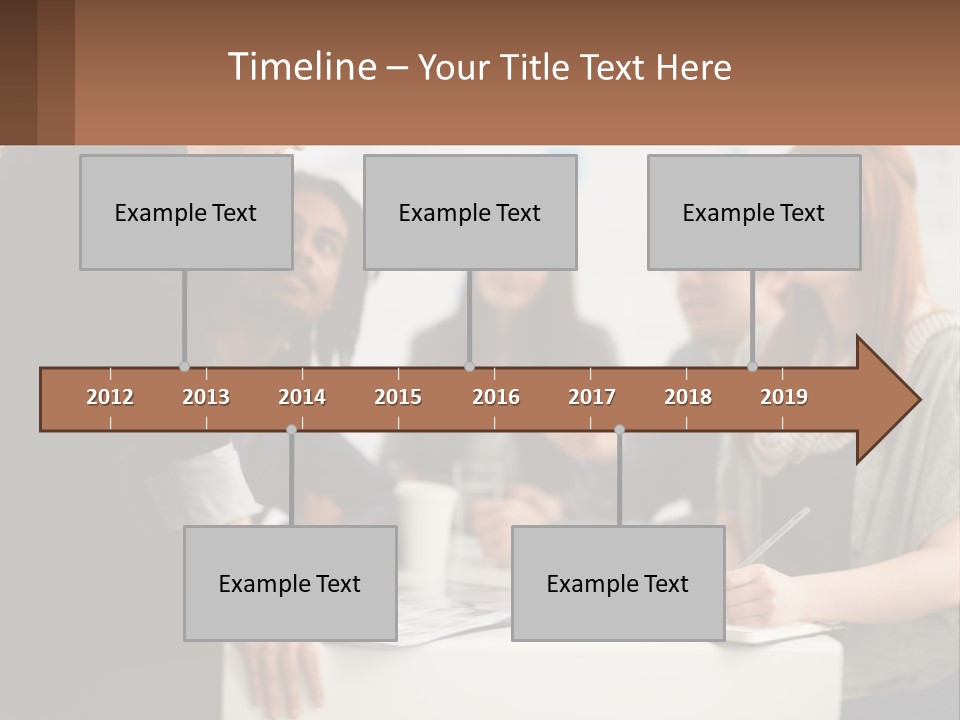 A Group Of People Sitting Around A Table Talking PowerPoint Template