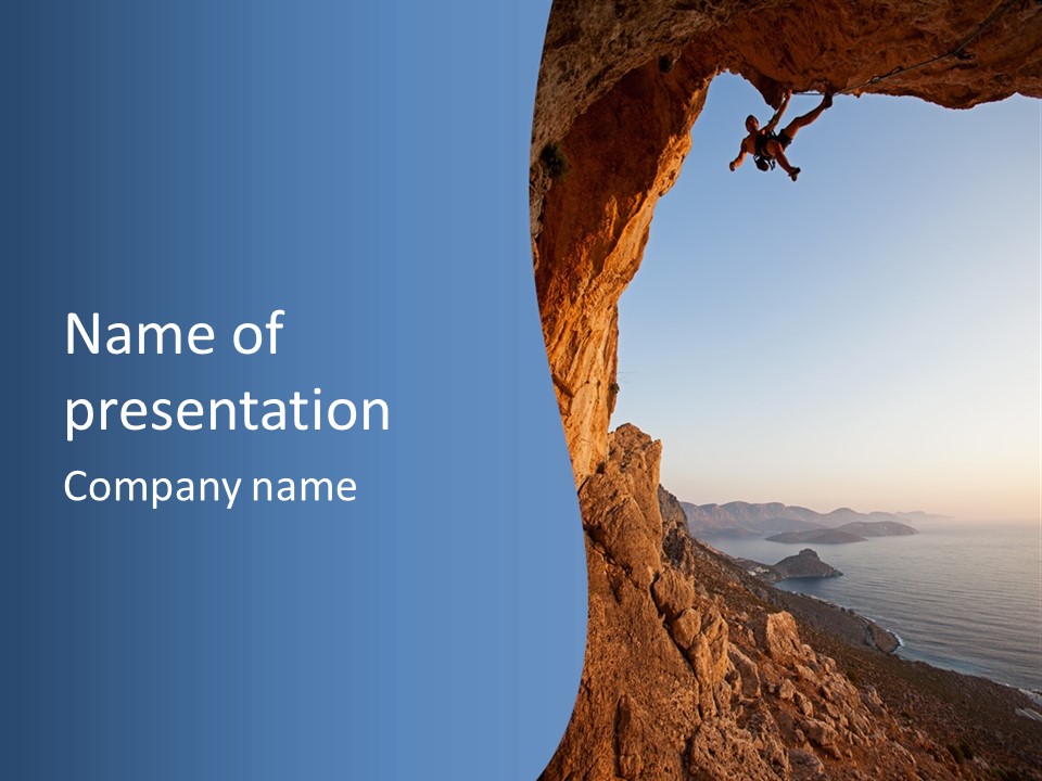 A Man Climbing Up A Cliff With The Ocean In The Background PowerPoint Template