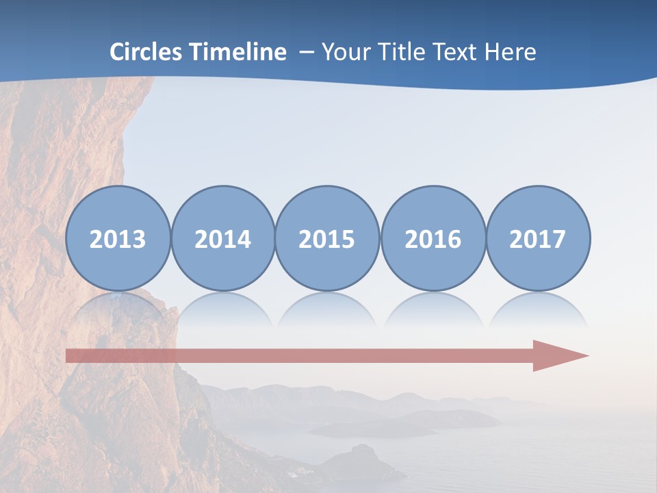 A Man Climbing Up A Cliff With The Ocean In The Background PowerPoint Template