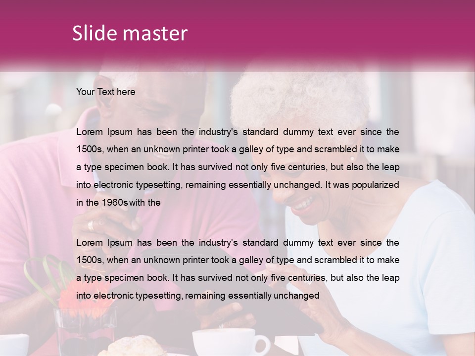A Man And Woman Sitting At A Table Looking At A Tablet PowerPoint Template