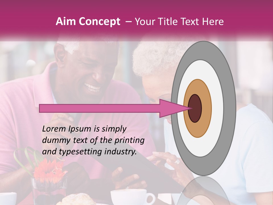A Man And Woman Sitting At A Table Looking At A Tablet PowerPoint Template