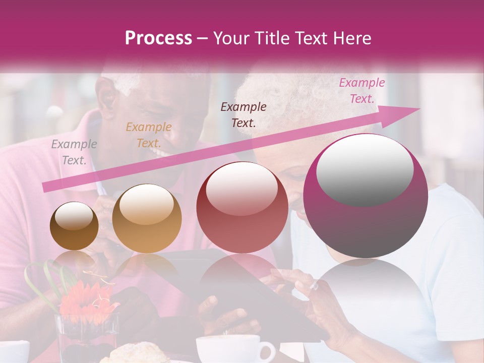A Man And Woman Sitting At A Table Looking At A Tablet PowerPoint Template