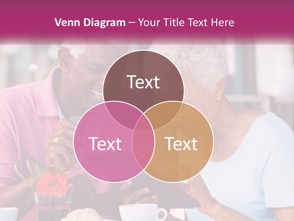 A Man And Woman Sitting At A Table Looking At A Tablet PowerPoint Template