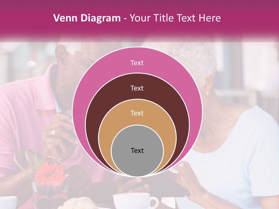 A Man And Woman Sitting At A Table Looking At A Tablet PowerPoint Template