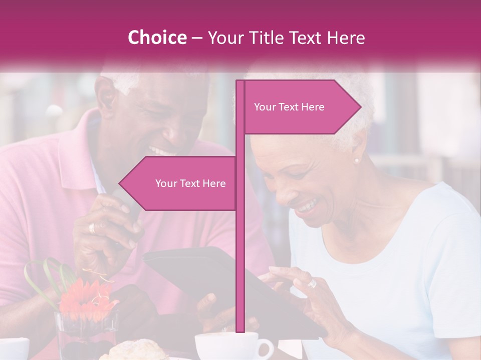 A Man And Woman Sitting At A Table Looking At A Tablet PowerPoint Template